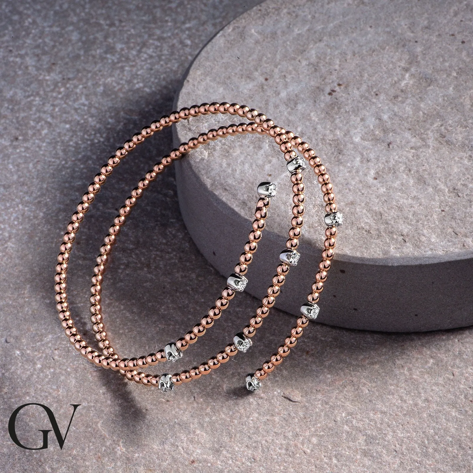 Bracciale a molla in oro bianco e rosa 18k con Diamanti