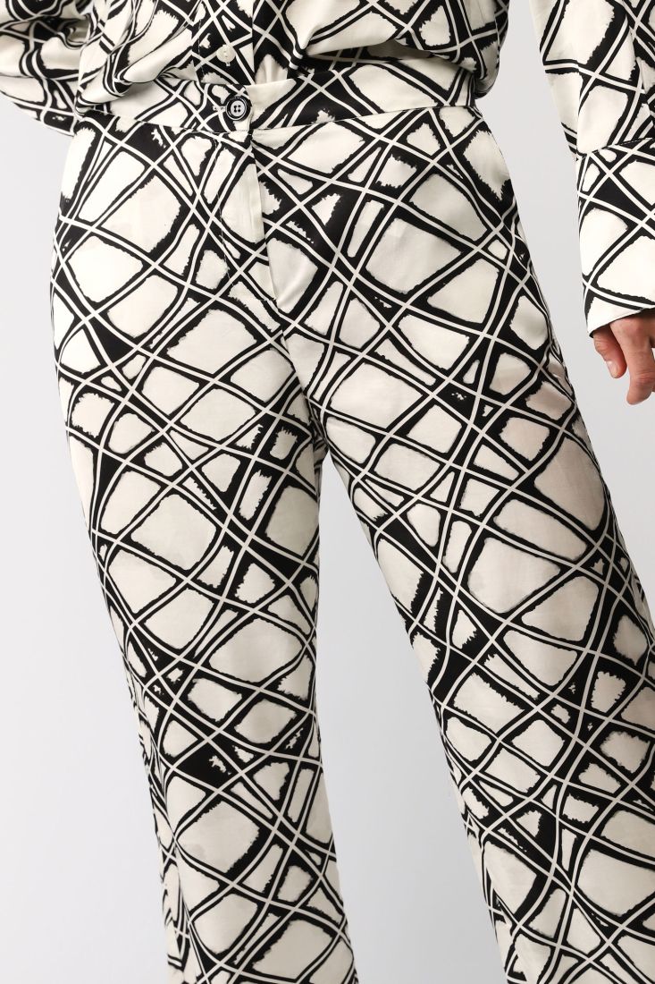 Pantaloni a palazzo fantasia astratta con tasche verticali