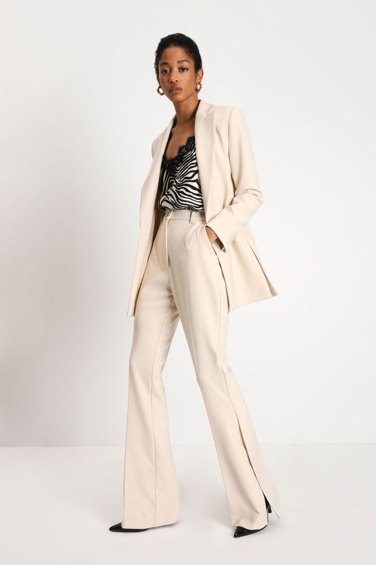 Pantaloni flare monocolour con piega stirata