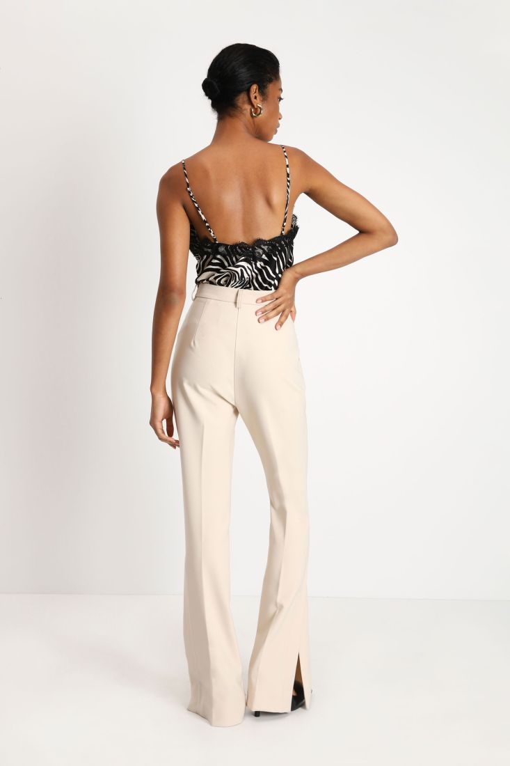 Pantaloni flare monocolour con piega stirata