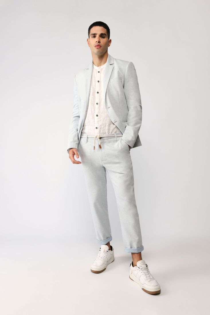 Pantaloni straight con cintura in corda e orli risvoltati