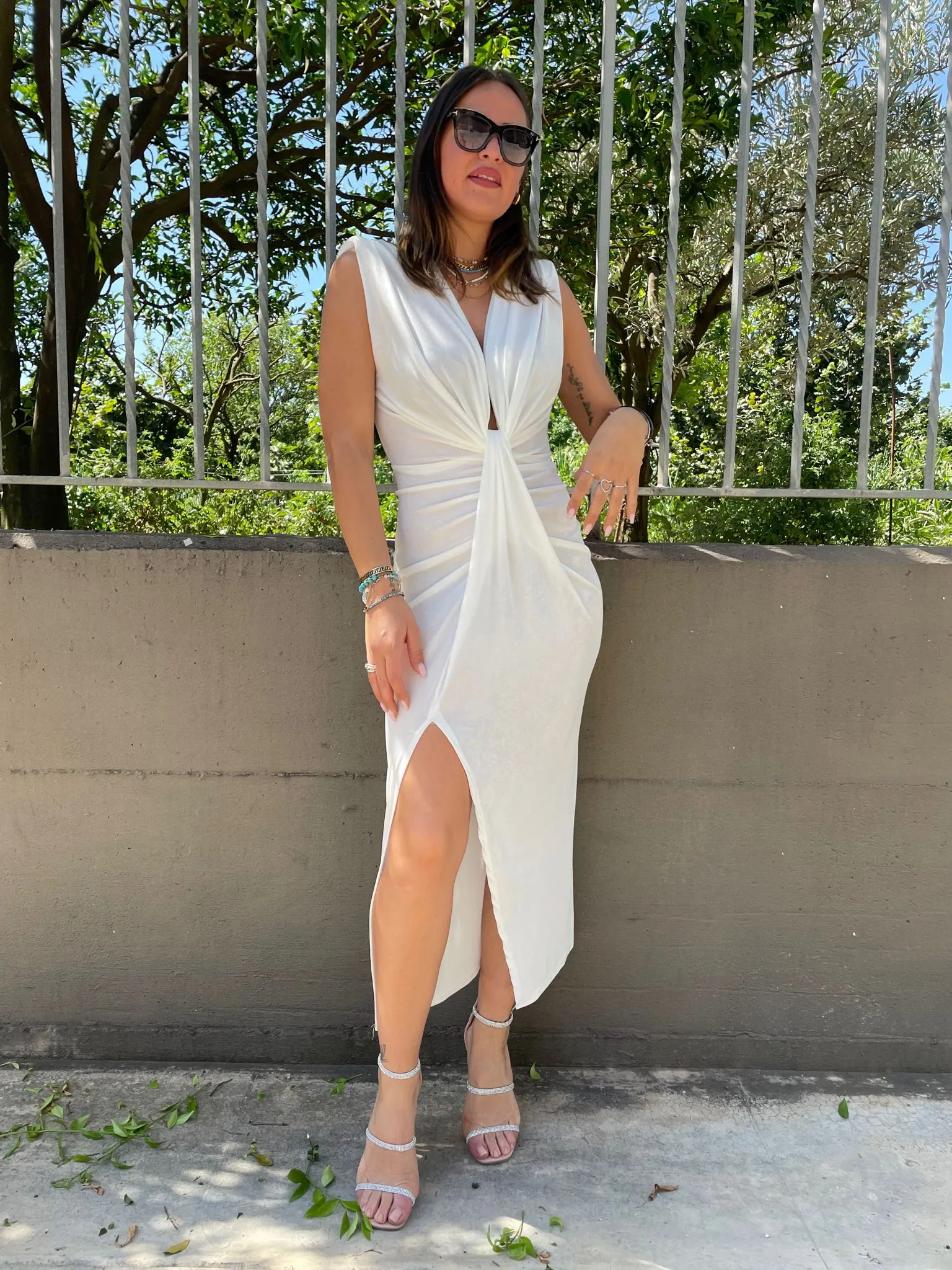 Vestito lurex tinta unita con scollo profondo